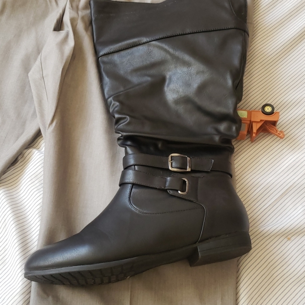 Knee length zip up boots